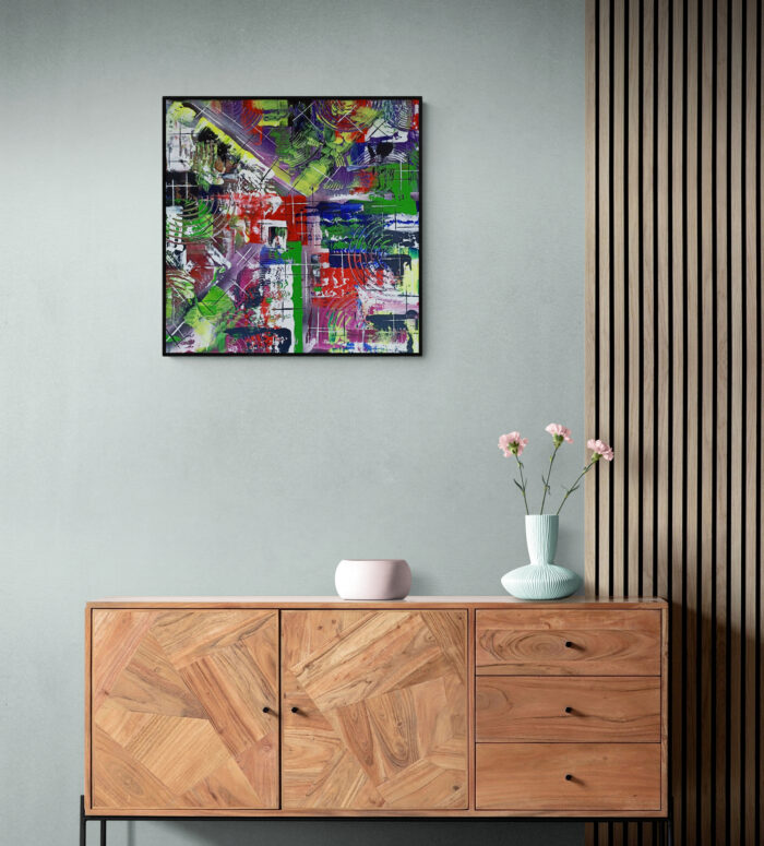 colorful flowers in vase sitting on cabinet